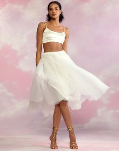 Ballerina style white tulle skirt. Lined Elastic waistband Midi length Fabric content: 100% polyester Care instructions: dry clean recommended Fit: model is 5'10" and wears a size S. Size S measurements: Length: 31" White Tulle Midi Skirt, White Tulle Skirt, Tulle Skirt Black, Ballerina Style, White Tulle, Fancy Outfits, Cynthia Rowley, New Arrival Dress, Bottom Clothes