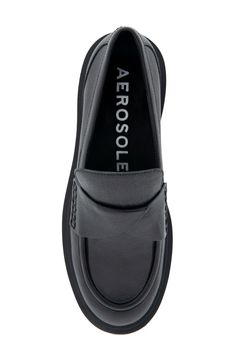 This updated penny loafer offers both modern style and effortless comfort thanks to a cushioned footbed and lightweight, flexible sole. OrthoLite® footbed Leather upper/synthetic and textile lining/synthetic sole Imported Synthetic Slip-on Loafers With Leather Sole, Modern Slip-ons With Ortholite Insole For Work, Modern Synthetic Loafers With Leather Sole, Modern Synthetic Slip-ons For Business, Modern Flat Loafers With Branded Insole, Modern Business Loafers With Cushioned Footbed, Business Loafers With Ortholite Insole, Modern Business Slip-ons In Synthetic Material, Modern Slip-on Platform Loafers In Synthetic