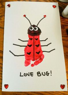 a card with a drawing of a ladybug on it that says love bug