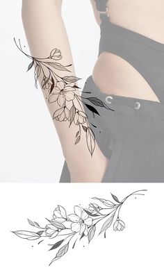 a woman's arm with flowers and leaves tattooed on the left side of her body