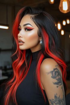 Combine jet black with vibrant cherry red highlights for a high-contrast look that feels fresh and modern. The red adds dimension to the black, giving the hair a dynamic edge. Contrast Hair, Red Highlights, High Contrast, Hair A, Cherry Red, Color Ideas, Jet Black, Hair Trends, Highlights