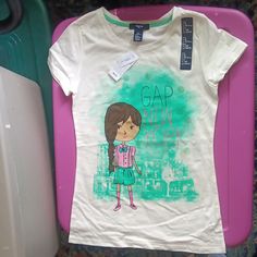 Opalescent Embellishments On Front White Gap T-shirt With Graphic Print, Gap White Graphic Print T-shirt, White Graphic Tee By Gap, White Gap Graphic Tee, Gap Green Cotton Tops, Green Cotton Gap Tops, Green Cotton Tops By Gap, Green Cotton Tops From Gap, Gap White Graphic Tee T-shirt