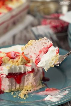 a piece of strawberry shortcake on a plate with a fork