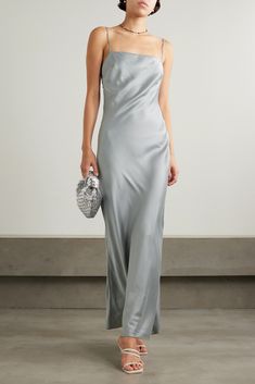 ST. AGNI's slip dress is an investment that you'll wear season after season. It's cut on the bias from soft stretch silk-blend satin and twirls to reveal a low back. It showcases exactly what this label does best: simple elegance with quality woven in every thread. Grey Satin Dress Outfit, Grey Dress Formal, Long Silver Dress, Silver Silk Dress, Silver Satin Dress, Grey Satin Dress, Satin Dress Outfit, Build Wardrobe, Grey Silk Dress