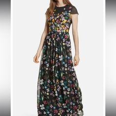 Questions? Leave A Comment Below! Ted Baker London Black Floral Embroidered Bodice Print Chiffon Mariz Maxi Dress Size: 1 = 4 Us Color: Black Multi Fanciful Florals Decorate This Enchanting Maxi, Fashioned With Sheer Capped Sleeves, A Cinched Waist And A Flowing Skirt. Keyhole Back With Button Closure. Jewel Neck. Cap Sleeves. Lined. Evening Floral Applique Maxi Dress, Black Floral Embellished Evening Dress, Floor-length Embroidered Dress For Spring Formal, Formal Embroidered Floor-length Dress For Spring, Formal Spring Embroidered Floor-length Dress, Floral Embroidery Maxi Evening Dress, Floral Embroidered Maxi Evening Dress, Black Embroidered Maxi Dress For Spring, Spring Formal Embroidered Maxi Dress