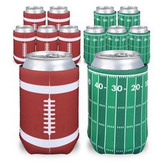 a large group of green and red football can coolers with white stripes on them