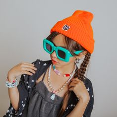 Stay cozy during chilly days with the Rags Knit Beanie in neon orange. With one-size-fits-all construction, this warm and fuzzy accessory is perfect for adults and kids alike! This beanie will make any winter outfit POP! Playful Adjustable Orange Hat, Trendy Acrylic Beanie One Size, One Size Orange Winter Hat, Trendy Knitted Beanie, Winter Orange Hat, One Size Fits Most, Orange Casual Hat One Size, Casual Orange Hat One Size, Winter Orange Hat, Casual Orange Hat