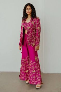 Magenta chanderi jacket with 3D butterfly motifs, dori and resham embroidery. Comes with flared pant and a bustier. Components: 3 Pattern: Embroidered Type Of Work: Butterfly motifs. Dori, Resham Neckline: Jacket : Lapel collar, Bustier : Sweetheart Sleeve Type: Jacket : Full, Bustier : Sleeveless Fabric: Chanderi Color: Magenta Other Details:  Closure : Jacket - Front button Note : Black outfit worn by the other model is not for sale. Occasion: Party,Cocktail - Aza Fashions Magenta Butterfly, Shrug Outfit, Resham Embroidery, Recycled Dress, Lehenga Designs Simple, Latest Dress Design, Desi Fashion Casual, Traditional Indian Outfits, Dress Design Patterns