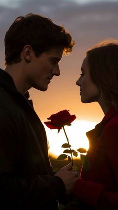 a man and woman standing next to each other with a rose in front of them