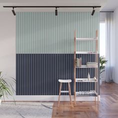 a room with a ladder, bookshelf and potted plant on the floor