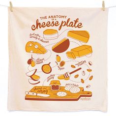 the anatomy of a cheese plate tea towel hanging on a clothes line with other food items