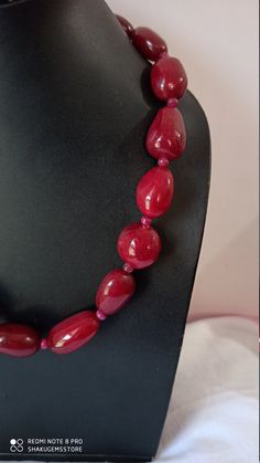 Supernatural 624 Ct Fine Quality Ruby Smooth oval Gemstone Necklace Stone : Ruby dyed Shape :- Smooth oval Necklace - 18 inch Size :- 16x22mm to 15x26mm Weight :- 624 carat Polish :- Handmade color - Red makes a great gift for your loved ones. Click below to see live stock: https://www.etsy.com/au/shop/ShakugemsStore?ref=search_shop_redirect If for any reason you are not satisfied with your purchase. You can return it for a full refund within 5 days (If you want maximum or minimum quantity of th Red Gemstone Necklace With Oval Beads, Oval Gemstone Beads For Jewelry Making, Oval Gemstone Beaded Necklaces For Jewelry Making, Oval Gemstone Beads Necklace Perfect For Gifts, Oval Beaded Necklaces With Natural Stones For Gifts, Oval Natural Stone Beads For Gifts, Oval Beaded Necklace With Large Beads As Gift, Elegant Necklace With Large Oval Beads, Oval Beaded Necklace With Large Beads For Gifts