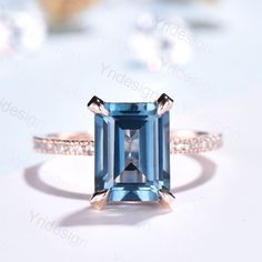 Emerald Cut London Blue Topaz engagement ring with diamond,Solid 14k Rose gold,promise ring,bridal,Basket Vintage Topaz Anniversary Ring London blue and diamond engagement ring in solid gold 14/18k white/yellow/rose gold available. Diamonds can be upgraded. Ring setting can be made. Ring can be resized. 30-Day Money Back guarantee.Customer Office in USA. Free Shipping to US. Jewelry Details: Round cut Moissanite or SI-H Natural Diamond 7x9mm Emerald cut Natural London Blue Topaz Normally the rin London Topaz Engagement Ring, Bridal Basket, London Blue Topaz Engagement Ring, London Blue Topaz Engagement Rings, Rose Gold Promise Ring, Gold Promise Ring, Topaz Birthstone, Blue Topaz Engagement Ring, Gold Promise Rings