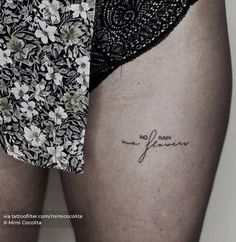 a woman's thigh with the word no rain written in cursive writing