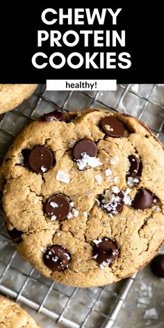 chewy protein cookies on a cooling rack with chocolate chips