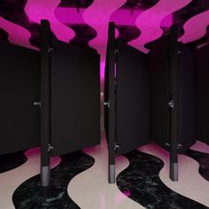 there is a room with black and pink walls