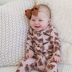 This extra cozy footie featuring classic teddy bears will have every parent falling even deeper in love with their little cub! The full-length zipper makes it easy to dress your baby quickly, while also ensuring that the footie stays securely in place. Made from high-quality bamboo viscose, this footie is soft and gentle on your baby's delicate skin and will keep your little one comfy all day long! One-Piece Footie Details: 95% Bamboo Viscose | 5% Spandex Footed One-Piece with Zipper and Grips D Personalized Newborn Outfit, Caden Lane, Personalized Swaddle, Newborn Accessories, Personalized Sweater, Personalized Throw Pillow, Bear Animal, Bamboo Pajamas, Baby Swaddle Blankets