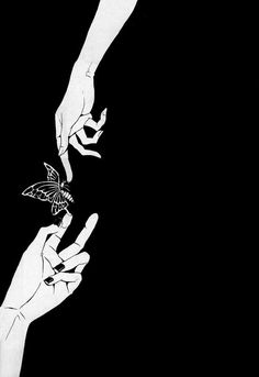 two hands reaching for a butterfly on top of each other's fingers in black and white