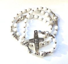 Rosary, catholic rosary, first communion, baptism, small, handmade, eucharist, white, roses, catholic gift, communion, Rosenkranz-Atelier White Spiritual Rosary Bracelet, Spiritual Cross Rosary Bracelet For Baptism, White Spiritual Rosary Bracelet With 8mm Beads, Pearl White Rosary With 8mm Beads As Gift, White Cross Jewelry With Miraculous Medal, White Spiritual Crucifix Jewelry, Spiritual White Crucifix Jewelry, White Crucifix Rosary With Miraculous Medal, Adjustable Rosary With Miraculous Medal And Crucifix