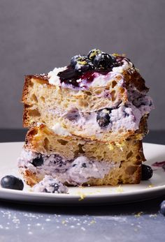 two slices of blueberry bread stacked on top of each other