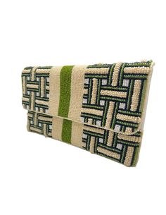 This beaded clutch also has a chain strap to wear as a crossbody. The beautiful beaded detail adds elegance and fun to any outfit. 10"x6" Beaded Rectangular Beach Clutch, Green Beaded Rectangular Clutch, Chic Beaded Rectangular Clutch, Chic Rectangular Beaded Clutch, Service Women, Beaded Clutch, Ladies Boutique, Handbag Accessories, Chain Strap