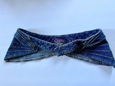 an old pair of jean shorts with a bow tie