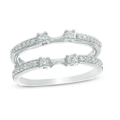 two white gold wedding rings with diamonds