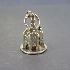 Hard to find vintage sterling silver Chichester Cross souvenir charm.  Hard to make out the hallmarks on the bottom but tested and guaranteed sterling silver. Visit Ribbons Edge for more great pieces of vintage and antique jewelry!  All items added to your cart at Ribbons Edge will automatically combine shipping. To stay up to date with my newest offerings, follow me on IG @ RibbonsEdge Silver Spiritual Vintage Charm, Antique Nickel-free Collectible Charms, Antique Sterling Silver Charms For Collectible, Antique Sterling Silver Charms For Collectors, Vintage Sterling Silver Pendant Charms, Vintage Sterling Silver Charms For Anniversary, Sterling Silver Vintage Charms For Anniversary, Collectible Silver Engraved Charms, Antique Sterling Silver Charms, Nickel Free