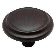 an image of a dark brown cabinet knob