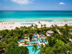 an aerial view of the beach and pool at sandals resort in cancuce, mexico