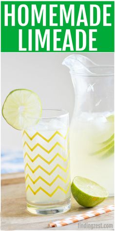 a pitcher of limeade next to a glass filled with lemonade