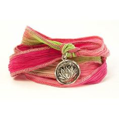 a bracelet with a flower charm on it