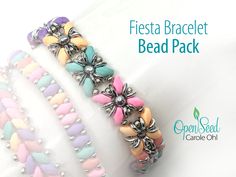 the bracelet is decorated with pastel colors and silver beads on it's sides