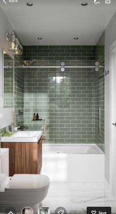 a bathroom with green tiles on the walls