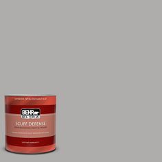 a can of behr ultra paint and primer on a gray background with the words,