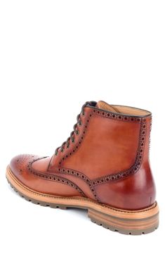 Burnished Italian leather enriches a stylish wingtip boot with cushioned arch support for all-day comfort. Lace-up style Leather upper and lining/rubber sole Imported Wingtip Boots, Up Styles, Arch Support, Chukka Boots, Italian Leather, Boots Men, Rubber Sole, Leather Upper, Arch