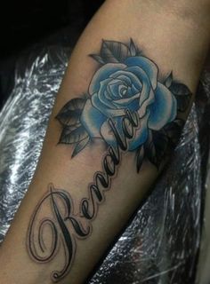 a blue rose with the word berea written on it's arm and in cursive writing