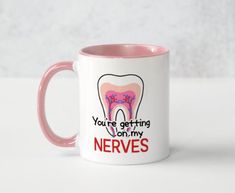 Dental Coffee Mug, Dentist Gift, Dentist Mug, Dentist Cup, Dental Mug, Funny Dentist Gift, Dentist Gift Idea 11-oz. capacity Dishwasher- & microwave-safe Ceramic material White exterior Pink Handle & interior color  Color and design on both sides of the cup. Have a great morning huddle drinking from your favorite coffee mug that shows how you really feel! Order one for your dental BESTIE Dentist Gift Basket, Tumbler Cup Tooth, Gifts For Dental Hygienist, Dentist Gift Ideas, Dental Assistant Cups, Getting On My Nerves, Dental Ceramics, Dental Cups Coffee Mugs, Dentist Mug