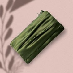 "Olive green wedding clutch wristlet. Available in two sizes. The regular size (4'x 8\") fits your cell phone and a few small items such as a lipstick and a compact powder. The larger size (10\"x5\") fits a small wallet, a cell phone, and a few make-up items. Dimension: Regular: 4\"X8\" Large: 5\"x 10\" Pleated detail on the front Fabric: satin  Made in the USA ** If ordered with name/ message inscription: Please note your inscription in the personalization box. ** If ordered with a photo lining Elegant Rectangular Pouch With Cell Phone Pocket, Elegant Evening Pouch With Cell Phone Pocket, Evening Pouch With Cell Phone Pocket, Rectangular Green Clutch For Gift, Green Rectangular Clutch For Gift, Green Rectangular Clutch Gift, Green Rectangular Clutch As Gift, Rectangular Evening Wristlet, Green Rectangular Wristlet With Zipper Pouch