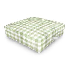 a green and white checkered mattress cover