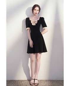 Buy retro bow knot square neckline black party dress with sleeves high quality at affordable price online. Free shipping and pro custom service since 2009. Evening Dresses With Bow And Square Neck, Square Neck Evening Dress With Bow, Short Sleeve Mini Dress With Bow For Party, Fitted Mini Dress With Bow And Square Neck, Black A-line Dress With Bow, Black Party Dress With Square Neck, Retro Square Neck Party Dress, Chic Square Neck Mini Dress For Banquet, Black Dress With Bow And Short Sleeves