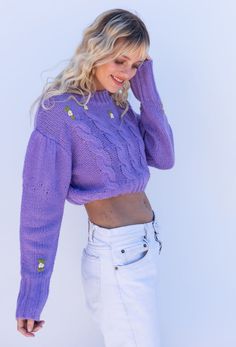 The Spring In The Alps Sweater features embroidered ivory flower detail, cropped body, contrast ribbed detail at neck, cuff and hemline and cable knit front design. Also comes in Ivory! Color: Lavender Embroidered Floral Detail Cropped Body Contrast Ribbed Detail Acrylic Model is 5'5", 32A Bust and wearing size Small Also Comes In Ivory Spring Crochet Tops, Purple Sweater With Ribbed Cuffs For Spring, Spring Fitted Cable Knit Cropped Sweater, Fitted Cable Knit Cropped Sweater For Spring, Spring Cropped Cable Knit Sweater, Spring Cropped Cable Knit Top, Spring Cable Knit Cropped Top, Cropped Cable Knit Top For Spring, Spring Crochet