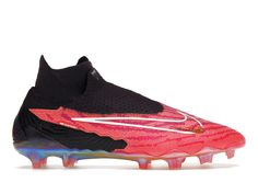 a pair of black and red soccer cleats