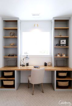 a desk and shelves in a room with light colored walls, white flooring and beige carpet