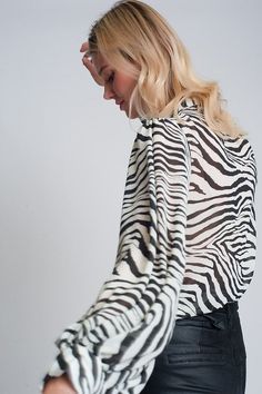 Our oversized voluminous sleeve blouse has an all-over zebra print with button placket and button cuffs. "Voluminous Sleeve Zebra Printed Blouse" 100% Polyester. Volume Sleeves, Mens Leather Pants, Flowy Sleeves, Puff Sleeve Blouse, Long Puff Sleeves, Lace Fashion, Blouse Online, Printed Ties, Pleated Mini Skirt