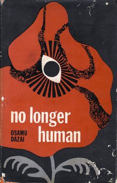 an old book with the title'no longer human'written in black and red