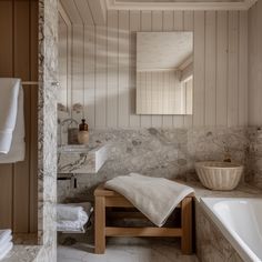 a bath room with a sink a mirror and a bath tub in it's corner