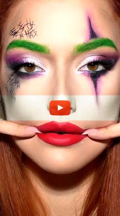 a woman with red hair and makeup has her face painted like a clown