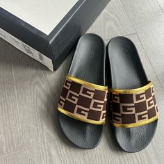 Gucci Slides Worn Once In Excellent Condition. Men’s Size 6 - Fits Like Women’s 9. Cloth Details With Gold. Comes With Box. Gucci Cushioned Slides, Gucci Casual Slip-on Slides, Gucci Designer Slip-on Slides, Gucci Leather Slip-on Slides, Gucci Slip-on Sandals With Cushioned Footbed, Gucci Slides, Gucci Black, Gucci Shoes, Pool Slides