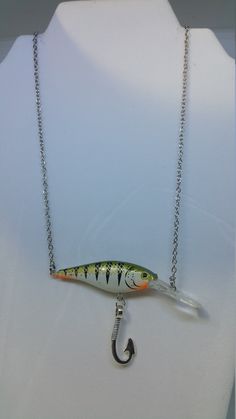 Stunning flicker shad fishing necklace with nickle free hook charm attached.  The 8.5m silver-tone trace chain is 24 inches long with a lobster clasp. Prunus Caroliniana, Fishing Hook Bracelet, Fishing Necklace, Fishing Jewelry, Angler Fish Necklace, Fish Hook Necklace, Fish Jewelry, Fish Necklace, The 8